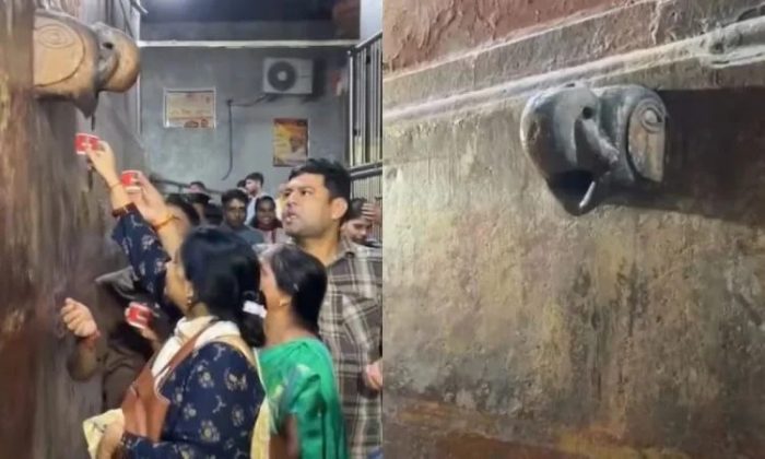 Em um templo em Vrindavan, na Índia, devotos formaram filas para beber o líquido que pingava de uma escultura de elefante (Foto: Reprodução/YouTube/News State)