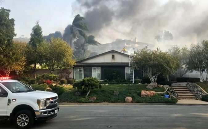 O casal foi forçado a evacuar sem tempo para preparar suas coisas (Foto: Reprodução/NBC News)